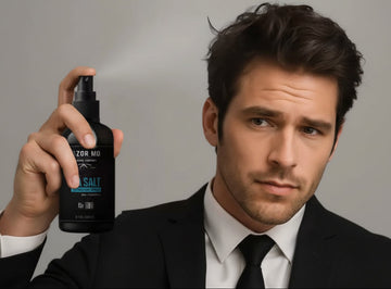 Man holding a bottle of 'RAZOR MD' Sea Salt product against a neutral background