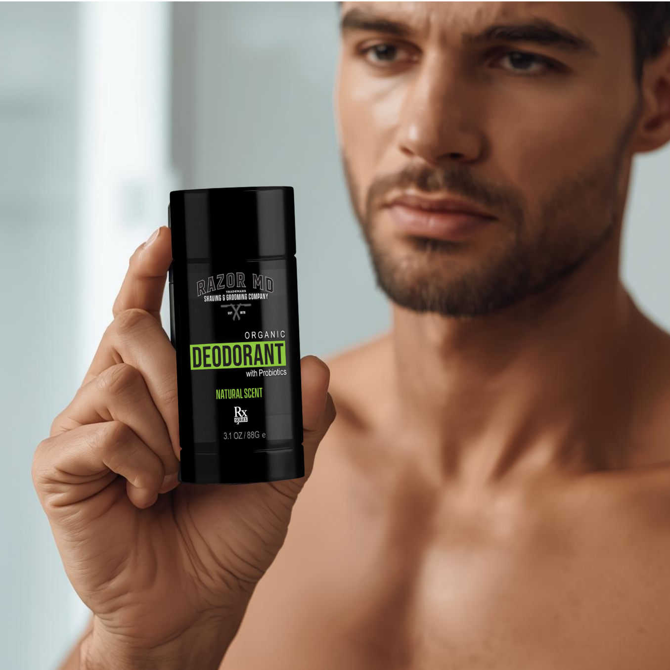 Man holding a RAZOR MDAluminum-Free deodorant  