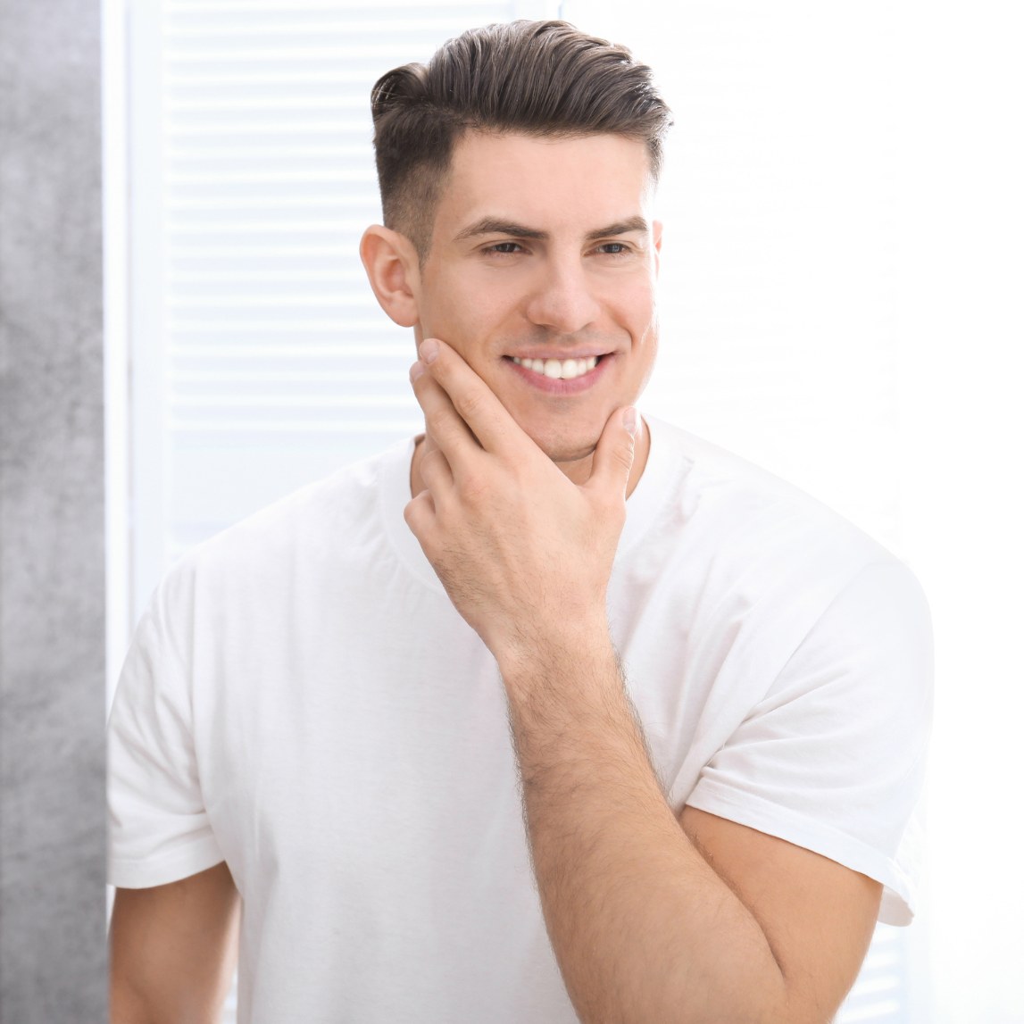 Man with a beard smiling, with RAZOR MD Pre-shave Oil